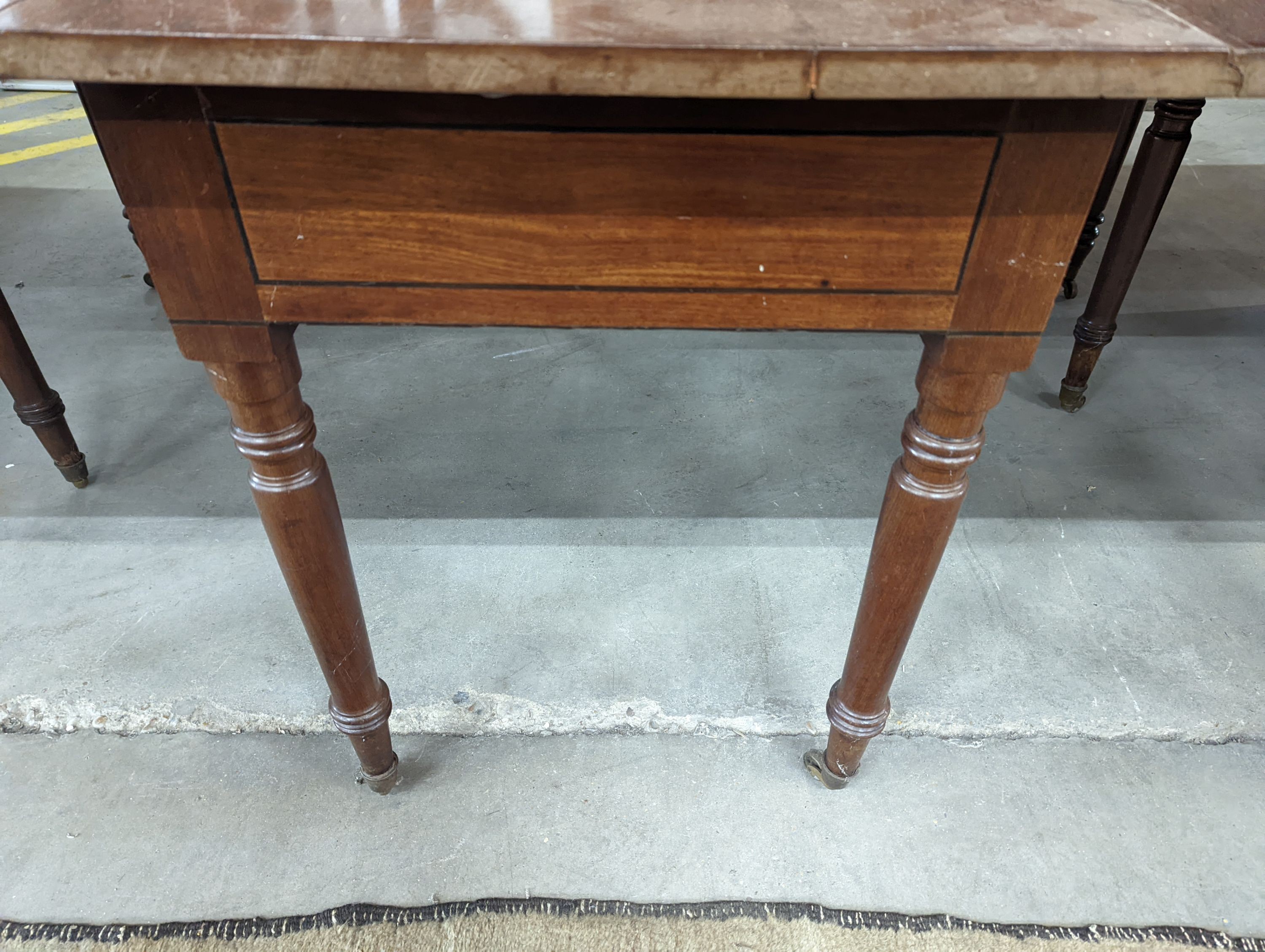 A George IV mahogany D end drop leaf extending dining table, 266cm extended, width 121cm, height 74cm